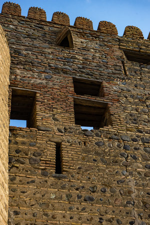 27 NOVEMBER 2019, KSANI, GEORGIA: Ruins of famous medieval castle Qsnis tsikhe on hill top over Ksani townのeditorial素材