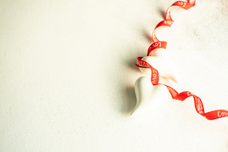 St. Valentines Day concept with heart shaped decor on stone background with copy spaceの写真素材