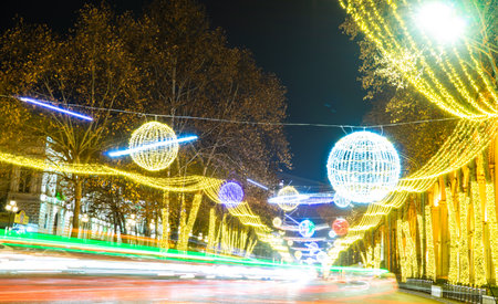 25 DECEMBER 2019, TBILISI, GEORGIA; New Year illumination with solar system over the main avenue of the city Rustaveli in Tbilisi's downtown, Tbilisi, Georgiaのeditorial素材