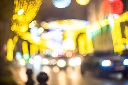 25 DECEMBER 2019, TBILISI, GEORGIA; Defocused New Year illumination over Rustaveli avenue in Tbilisi's downtown, Tbilisi, Georgiaのeditorial素材
