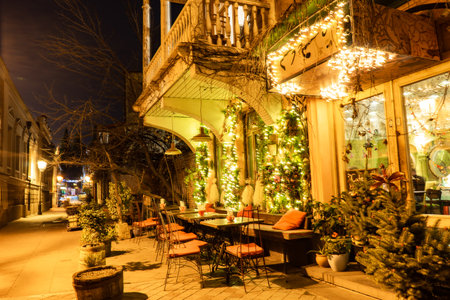 27 DECEMBER 2019, TBILISI, GEORGIA; Streets of Old Tbilisi with  New Year illumination in downtown and people enjoying a holiday time in Tbilisi, Georgiaのeditorial素材
