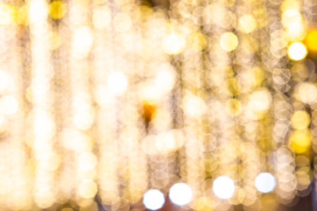 27 DECEMBER 2019, TBILISI, GEORGIA; Defocused New Year illumination in Orbelianubani in Tbilisi's downtown and people enjoying a holiday time in Tbilisi, Georgiaのeditorial素材