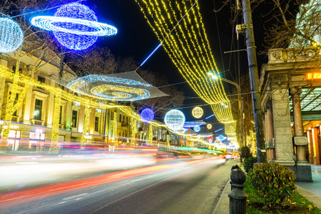 25 DECEMBER 2019, TBILISI, GEORGIA; New Year illumination with solar system over the main avenue of the city Rustaveli in Tbilisi's downtown, Tbilisi, Georgiaのeditorial素材