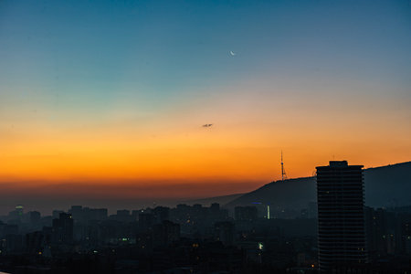 Dramatic sunrise over Tbilisi's downtown, capital city of Georgia, Caucasusの写真素材