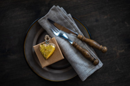 St. Valentine card concept with heart shaped decor on wooden background with copy spaceの写真素材