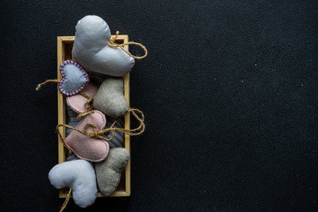 St. Valentine card concept with  hearts on stone background with copy spaceの写真素材