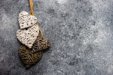 St. Valentine card concept with  hearts on stone background with copy spaceの写真素材