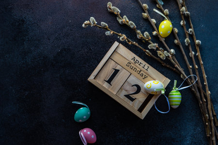 Easter card concept with colored eggs on stone background with copy space