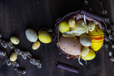 Easter card concept with eggs on rustic wooden background with copy space