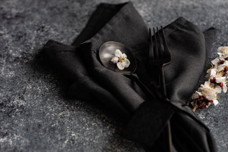 Table setting with modern cutlery on concrete background with copy spaceの写真素材