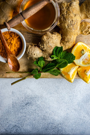 Ingredients for energy drink helping stay healthy with ginger, lemon, mint and turmeric
