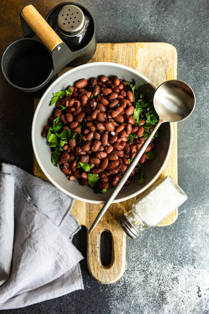 Traditional georgian dish lobio in ceramic bowl on stone background with copy spaceの写真素材