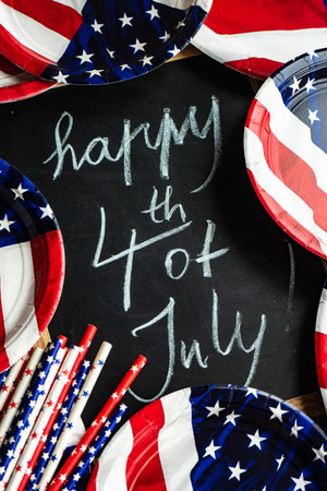 Table setting concept with 4th of July or USA Independence Day with flags on concrete background with copy spaceの写真素材