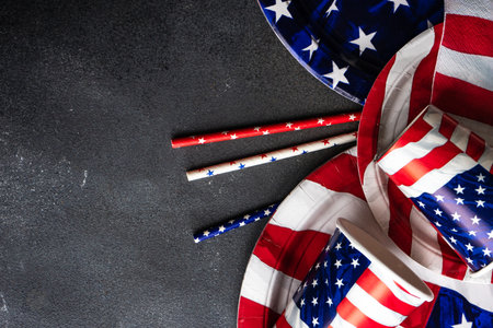 Table setting concept with 4th of July or USA Independence Day with flags on concrete background with copy spaceの写真素材