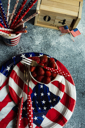 Table setting for celebration of 4th July or Independence day of USA on grey concrete background with copy spaceの写真素材