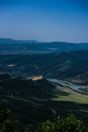 View to the old capital city of Georgian Kingdom - Mtskheta, close to Tbilisi, with  Djvari monastery and old townの写真素材