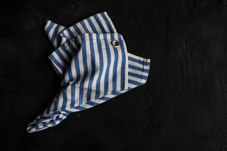 Vintage towel on black concrete background with copy spaceの写真素材
