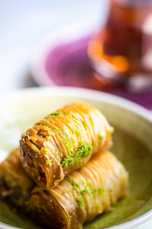 Famous turkish or oriental delight Baklava served with black tea