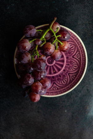 Organic fresh grape fruit on plate as a healthy food conceptの写真素材