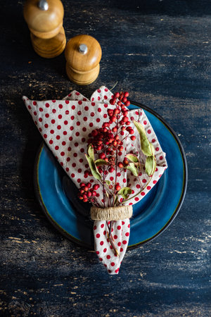 Thanksgiving day or autumnal harvest concept with frame with nuts, berries, vegetable and fruits on...