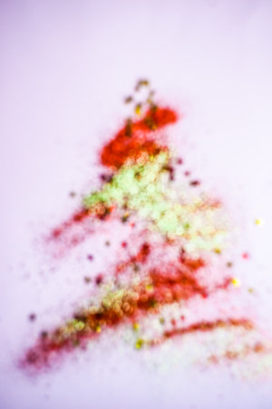 Christmas card concept with confetti on pastel background with copy spaceの写真素材
