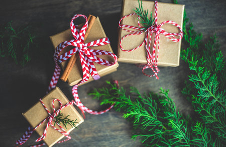 Christmas card concept with gift boxes decorated with ribbon and baubles