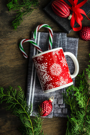 Empty plate with festive decor and cutlery on table fot Christmas dinnerの写真素材