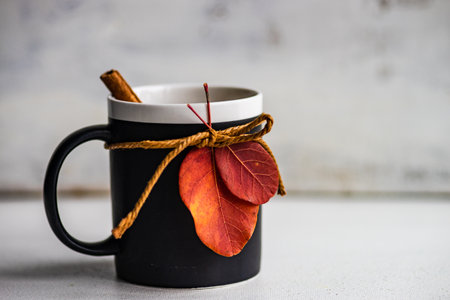 Cup of black tea and lemon on wooden background with copy spaceの写真素材