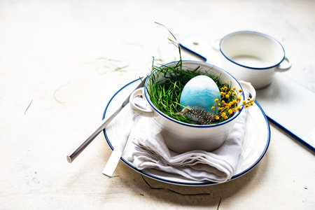 Easter place setting on concrete backround