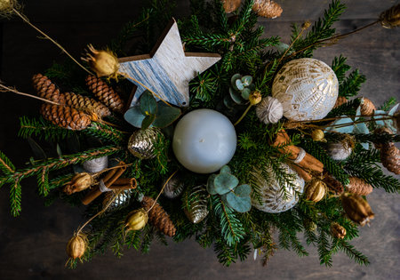 Christmas interior composition with cones, decoration and dry plantsの写真素材