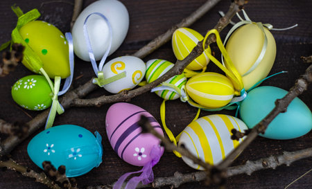 Easter card concept with variety of colorful eggs on wooden background