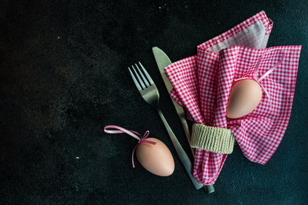 Easter table setting in dust pink with dry flowers on concrete tableの写真素材