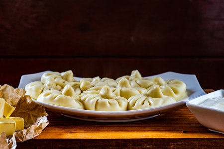 Traditional georgian vegetarian potato dumplings khinkali served to eat with pepperの写真素材