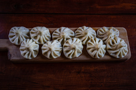 Traditional georgian dumplings khinkali served to eat with pepperの写真素材