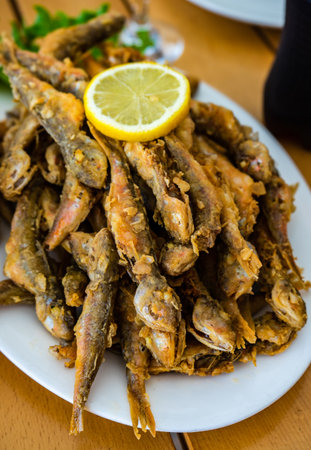 Traditional georgian adjarian mullus fish roasted with lemonの写真素材