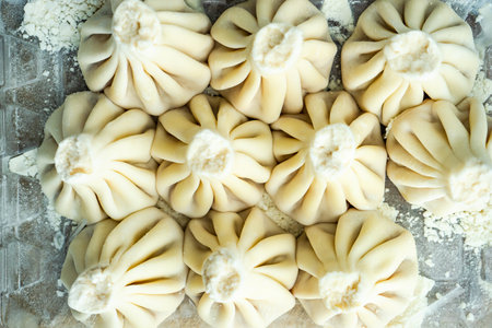 Traditional famous georgian khinkali dumplings on concrete background