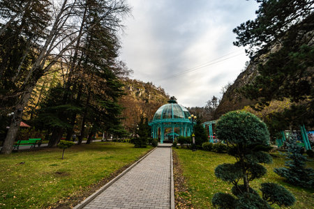Famous mineral water spring fountain in city park of Borjomi in the mountains of Georgiaの写真素材
