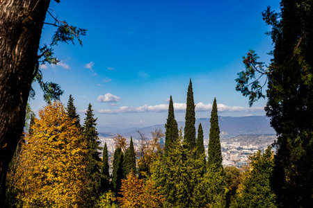 Autumnal view to Caucasus mountain from hill top over Tbilisi Old townの写真素材