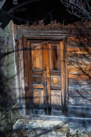 Old door in ethnografical georgian house in countryside close to Tbilisi, Georgiaの写真素材
