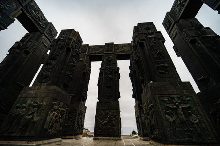 Stormy weather and giant monument of Georgian History on Tbilisi Sea shore, capital city of Georgia