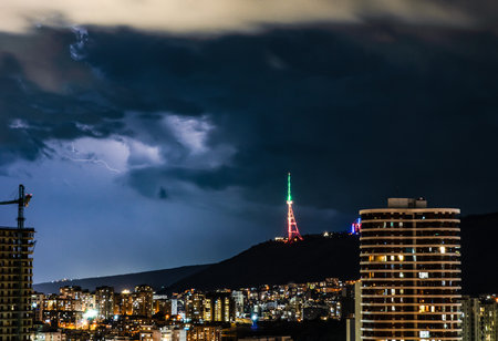 Dramatic evening sky with flashlight during thunder in Tbilisi, Georgiaの写真素材