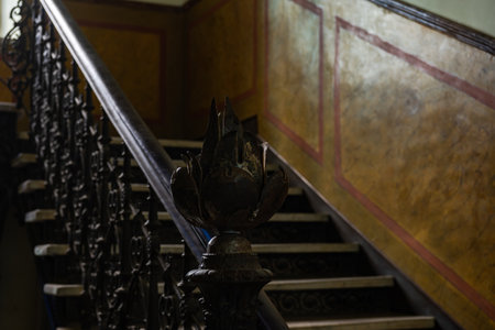 Interior of entrance hall with carved staircase in old maisons in Tbilisi's downtown, capital city...