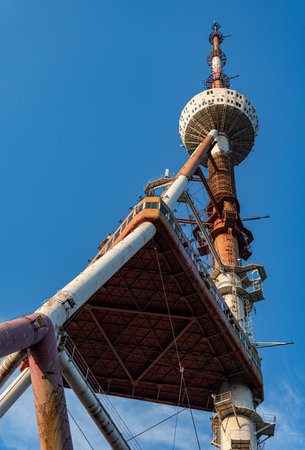 Tbilisi Tv Tower on Mtatsminda hill top on the blue sky background