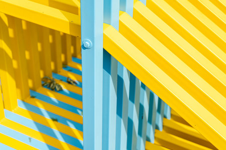 Blue and yellows tubes in sunny dayの写真素材