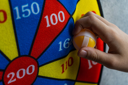 Bright color safe dartboard as a kids playtime conceptの写真素材