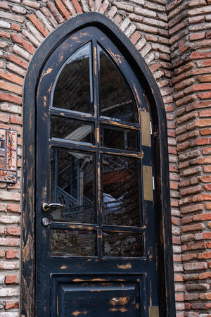 Old door and brick wall in the Old Tbilisiの写真素材