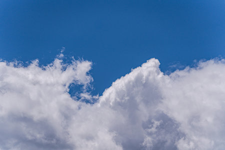 White textured clouds in the skyの写真素材