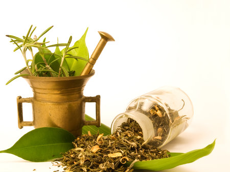 Pestle and pharmacy bottle, with herbs. Herbal tea.の写真素材