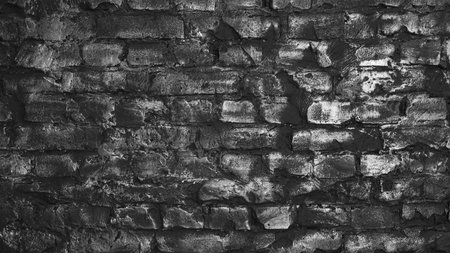 Stones background with scratched blotches, grunge design. Close-up of a crumbling brick wall.の写真素材