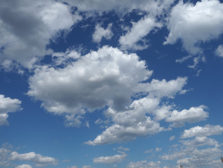 White clouds against blue sky. Nature beautiful background. Deep blue sky and white clouds.の写真素材
